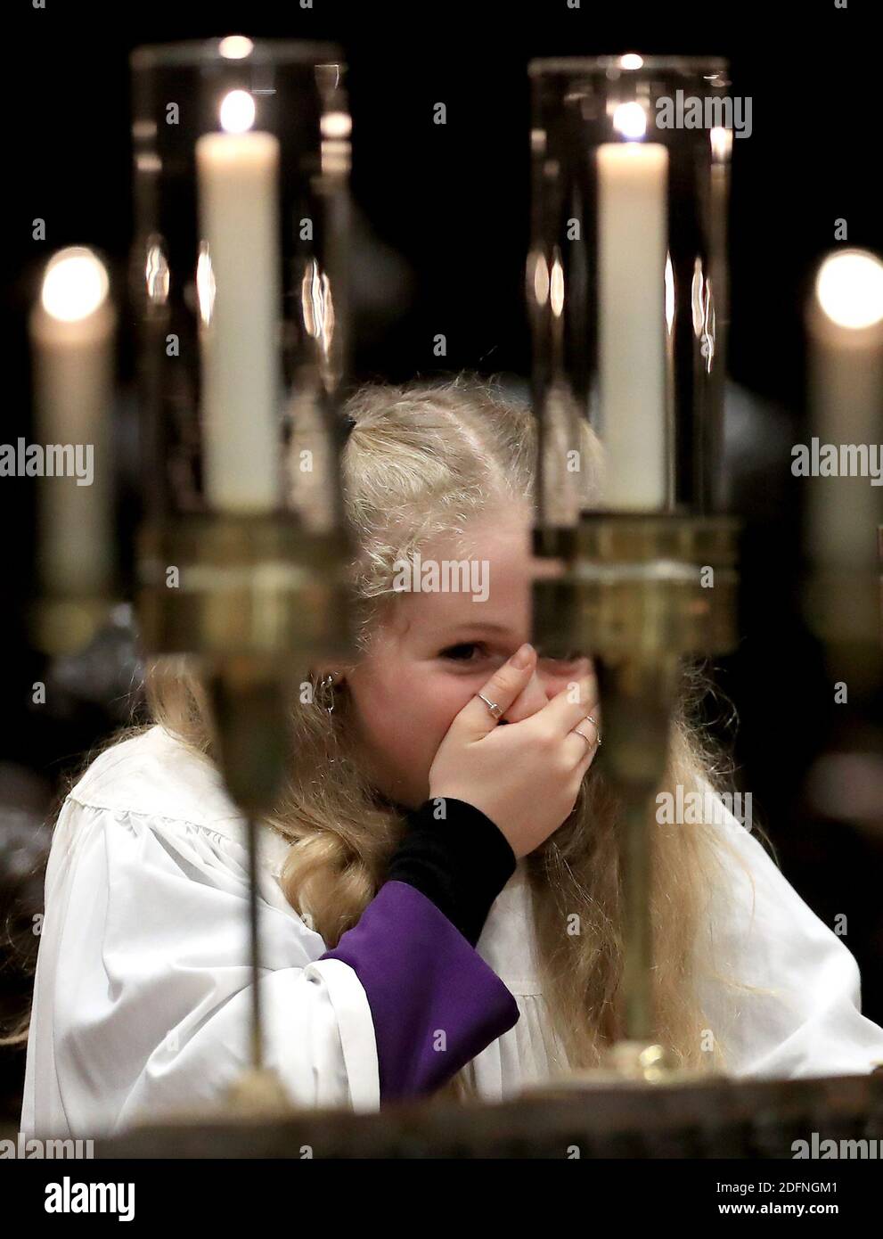 Members of the Canterbury Cathedral GirlsÕ Choir prepare to film the last of three pre-recorded online carol services which will be available to viewers on the cathedral website over the Christmas period. Stock Photo