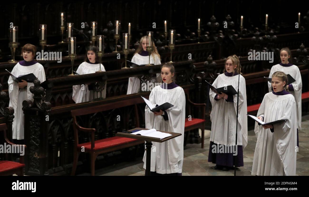 Members of the Canterbury Cathedral GirlsÕ Choir prepare to film the last of three pre-recorded online carol services which will be available to viewers on the cathedral website over the Christmas period. Stock Photo