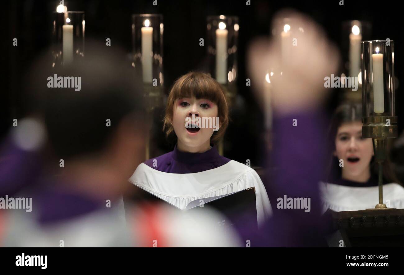 Members of the Canterbury Cathedral GirlsÕ Choir prepare to film the last of three pre-recorded online carol services which will be available to viewers on the cathedral website over the Christmas period. Stock Photo