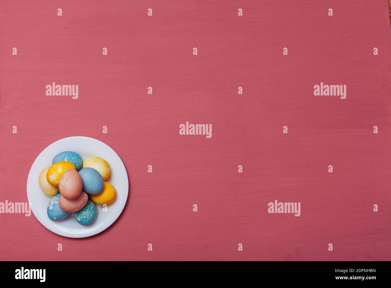 multi-colored chicken eggs for the Easter holiday as a backdrop Stock Photo