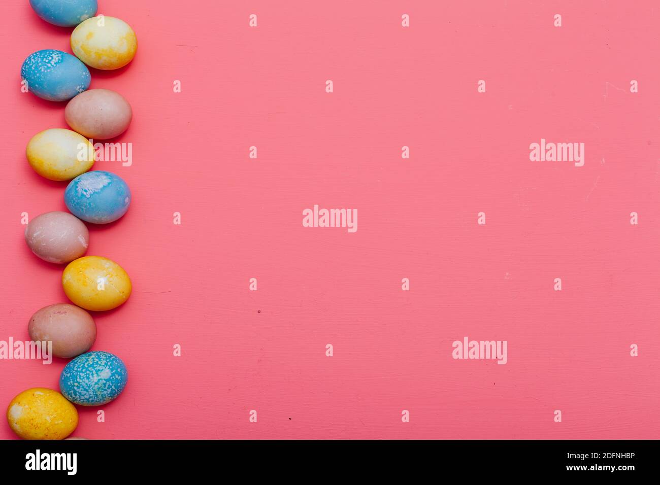 multi-colored chicken eggs for the Easter holiday as a backdrop Stock Photo