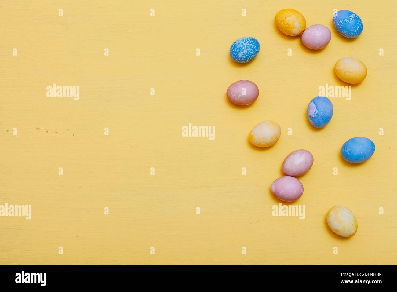 multi-colored chicken eggs for the Easter holiday as a backdrop Stock Photo
