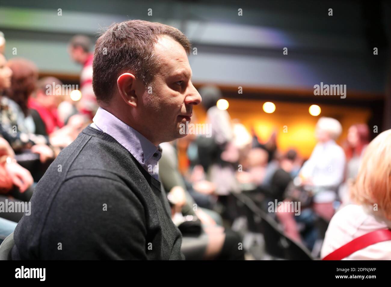 Portrait of man in hall at concert Stock Photo - Alamy