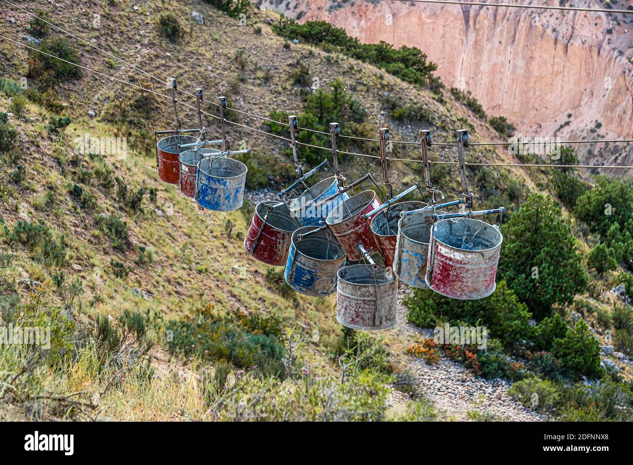 Bucket ropeway of a disused ore mine in Dijik, Tajikistan Stock Photo
