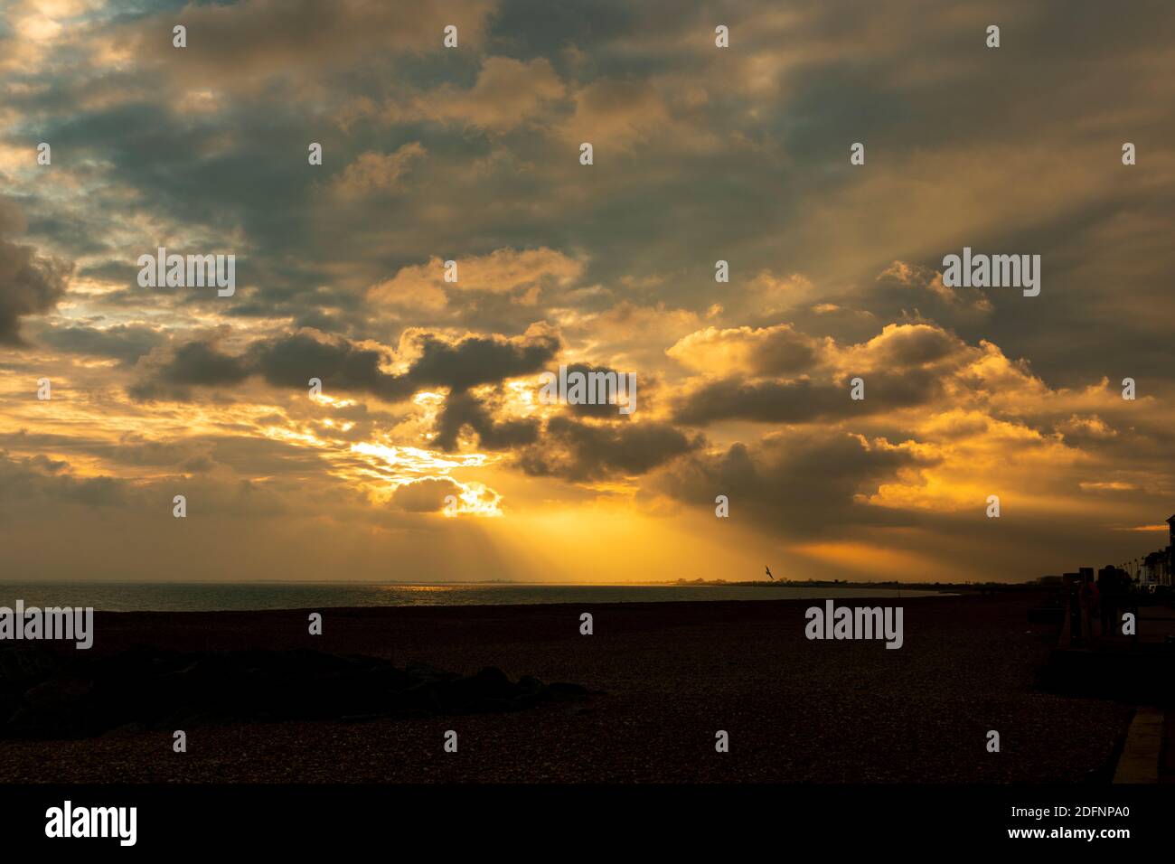 A sunset taken from Marine Parade, Hythe, Kent, UK. looking towards Dymchurch. Stock Photo