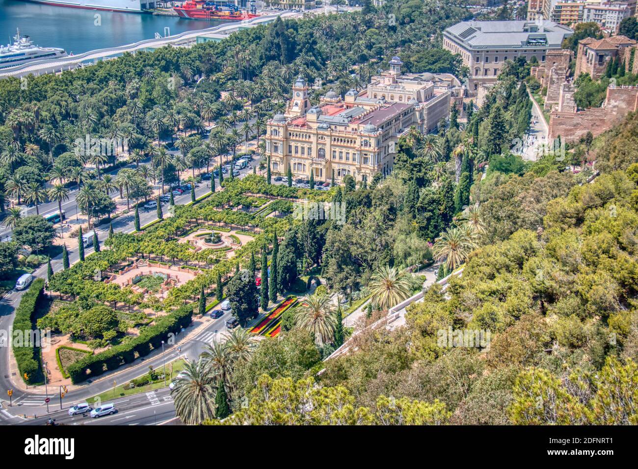 View of the city hall of the city of Malaga, surrounded by vegetation. Costa del Sol, Andalusia, Spain Stock Photo