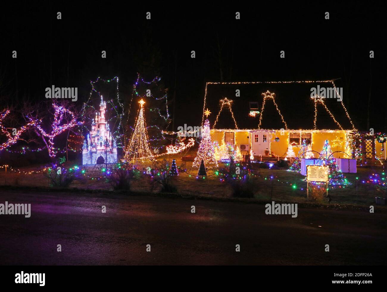 HÄLLESTAD, SWEDEN- 2 DECEMBER 2020: An owner of a house who did a music and light show at his house in these dark corona times. As many as 32601 lamps are located on the plot. If you drive past the house by car, you can adjust the sound with the car radio. Photo Jeppe Gustafsson Stock Photo