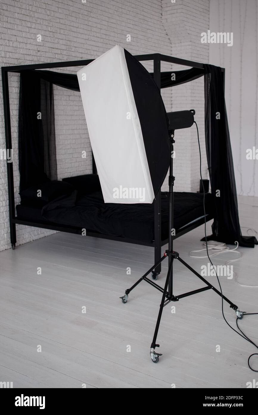 a flash with softbox in studio for photos Stock Photo