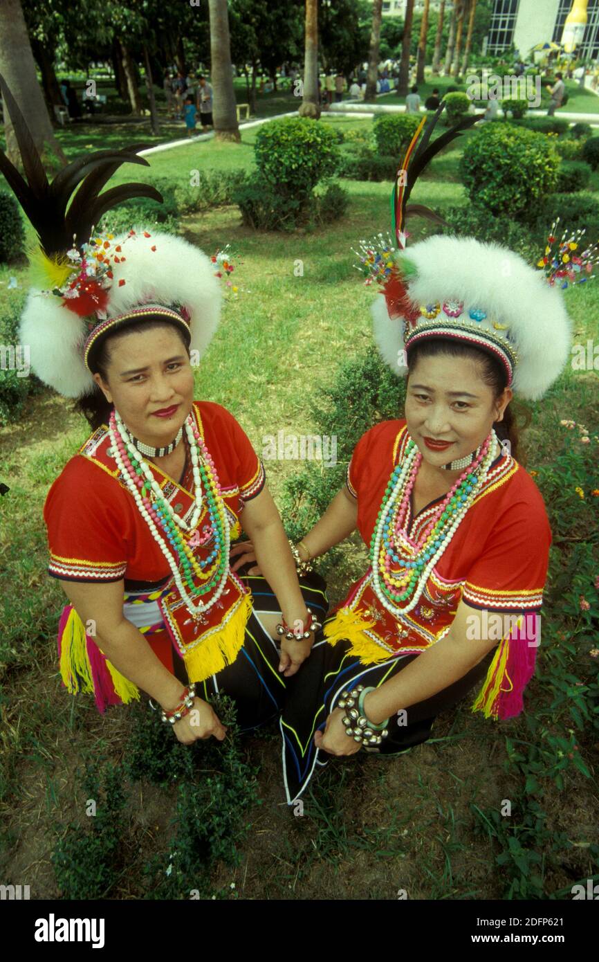 women in taiwanese traditional dress on a event in the city centre of Taipei in Taiwan of East Aasia.   Taiwan, Taipei, May, 2001 Stock Photo