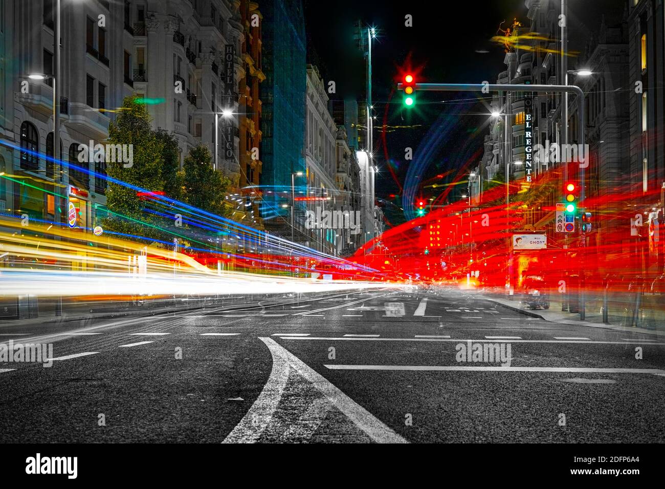 Madrid, Spain - September 27, 2020: -Long exposure night photography of Gran Via street in Madrid. Trails of lights from cars and traffic lights. Stock Photo