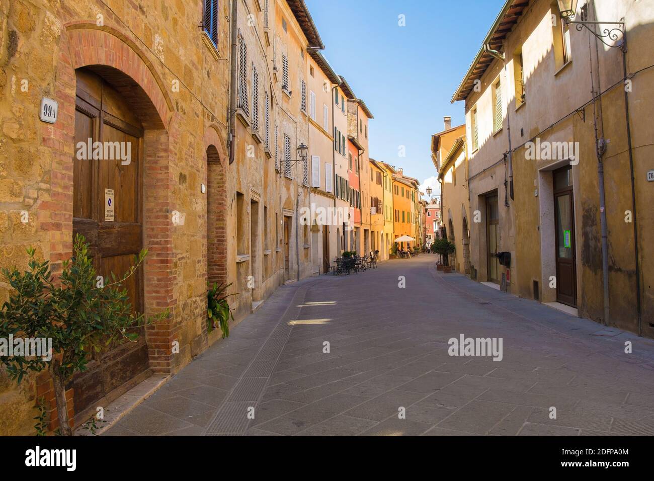 San Quirico D'Orcia, Italy - September 3rd 2020. A residential road with several bars in the historic medieval village of San Quirico D'Orcia, Siena P Stock Photo