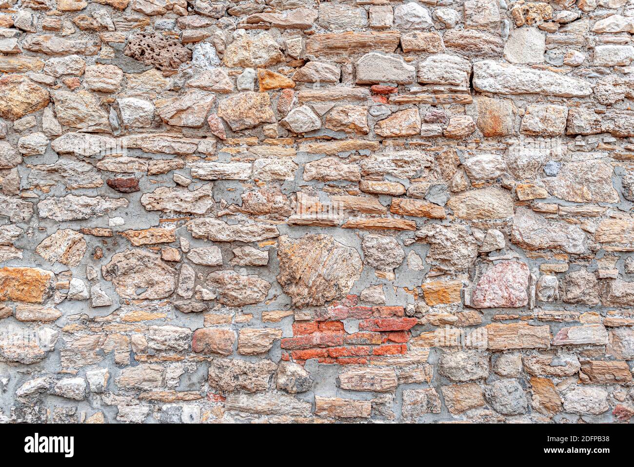 Wall from old gray bricks and stone as an abstract background Stock ...