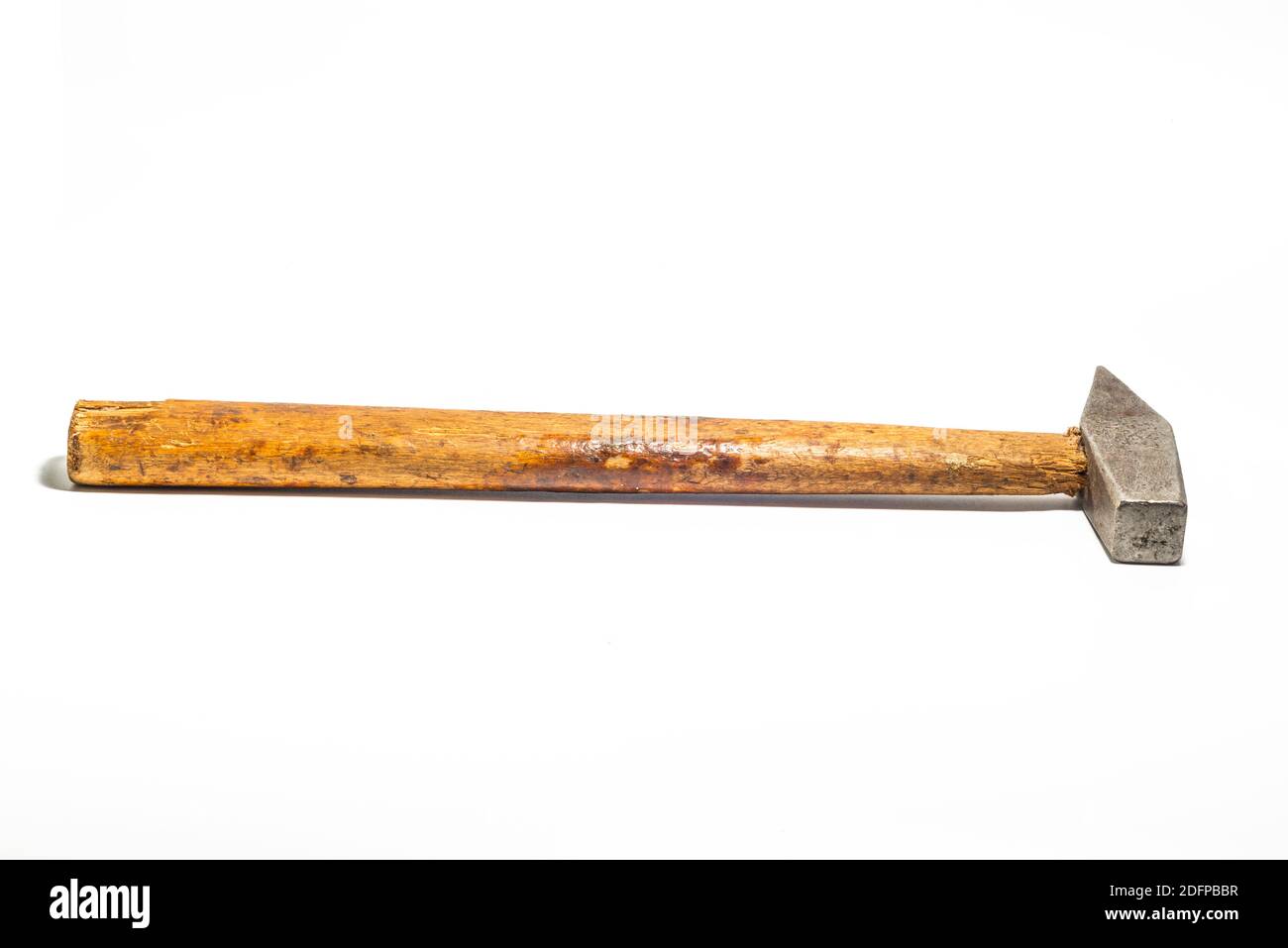old hammer with wooden handle isolated on white background Stock Photo