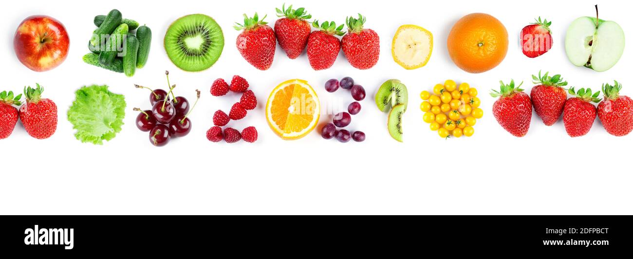 Fruits and vegetables. New year 2021 made of fruits and vegetables on the white background. Healthy food. Stock Photo