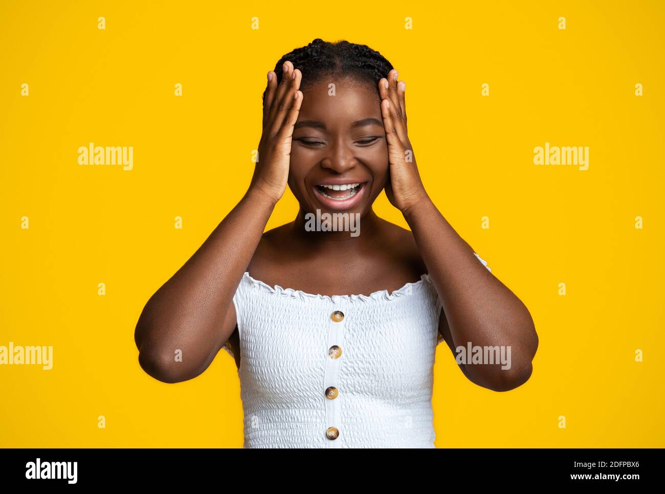 No Way. Laughing Black Woman Touching Head In Disbelief Over Yellow Background Stock Photo