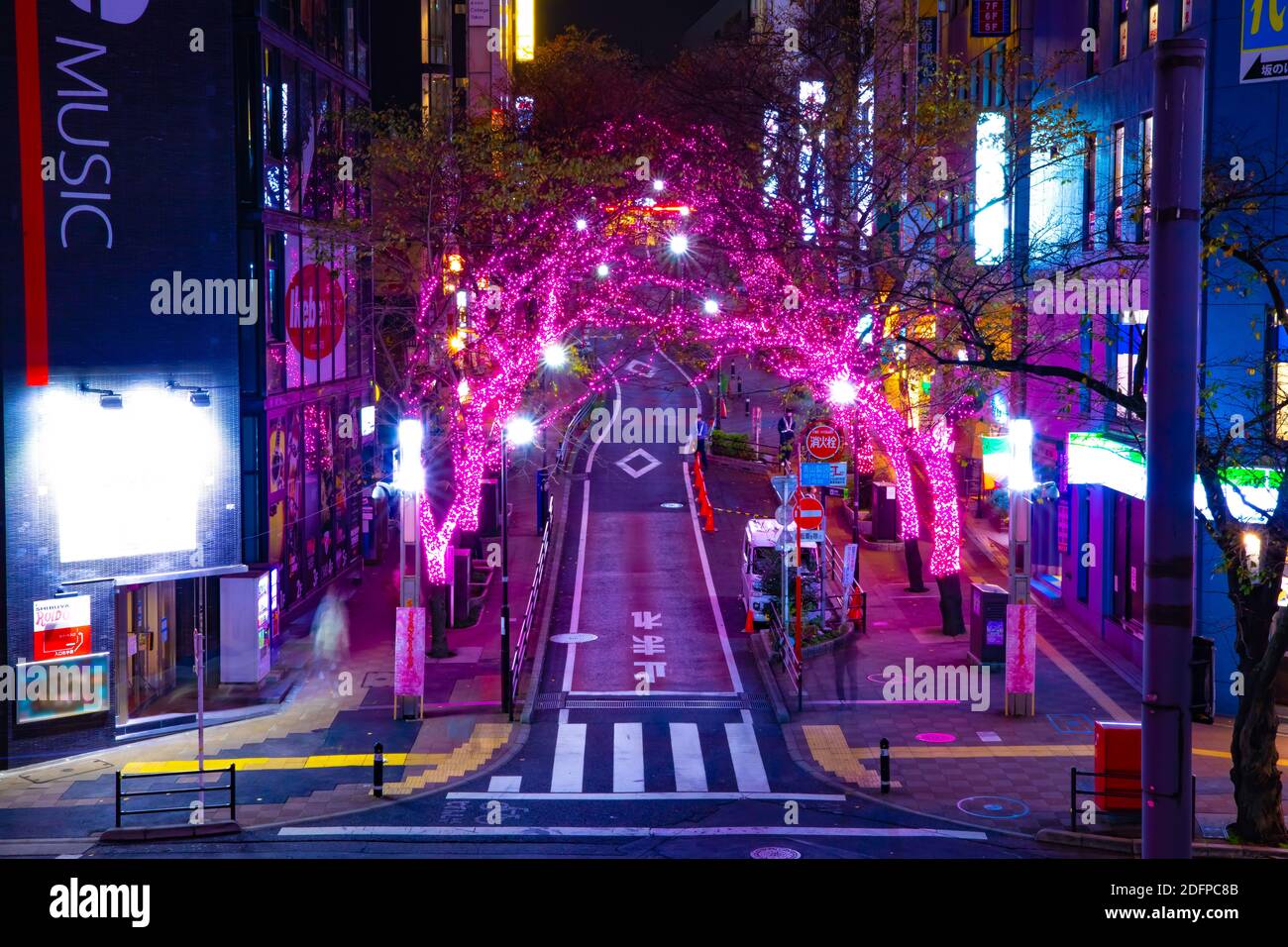 A night illuminated street in Shibuya middle shot Stock Photo - Alamy