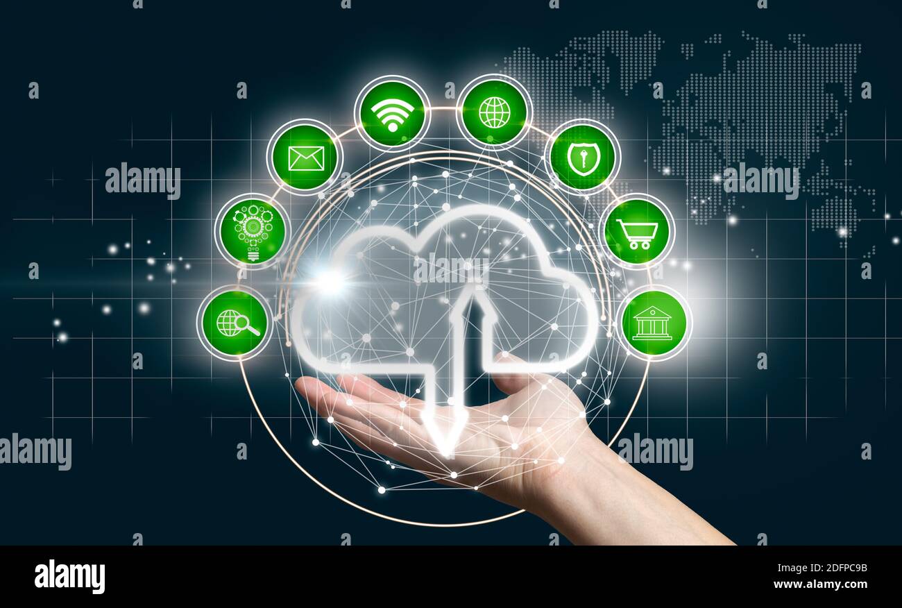 Hand holding the cloud icon as a Cloud computing, Technology connectivity concept. Mixed media Stock Photo