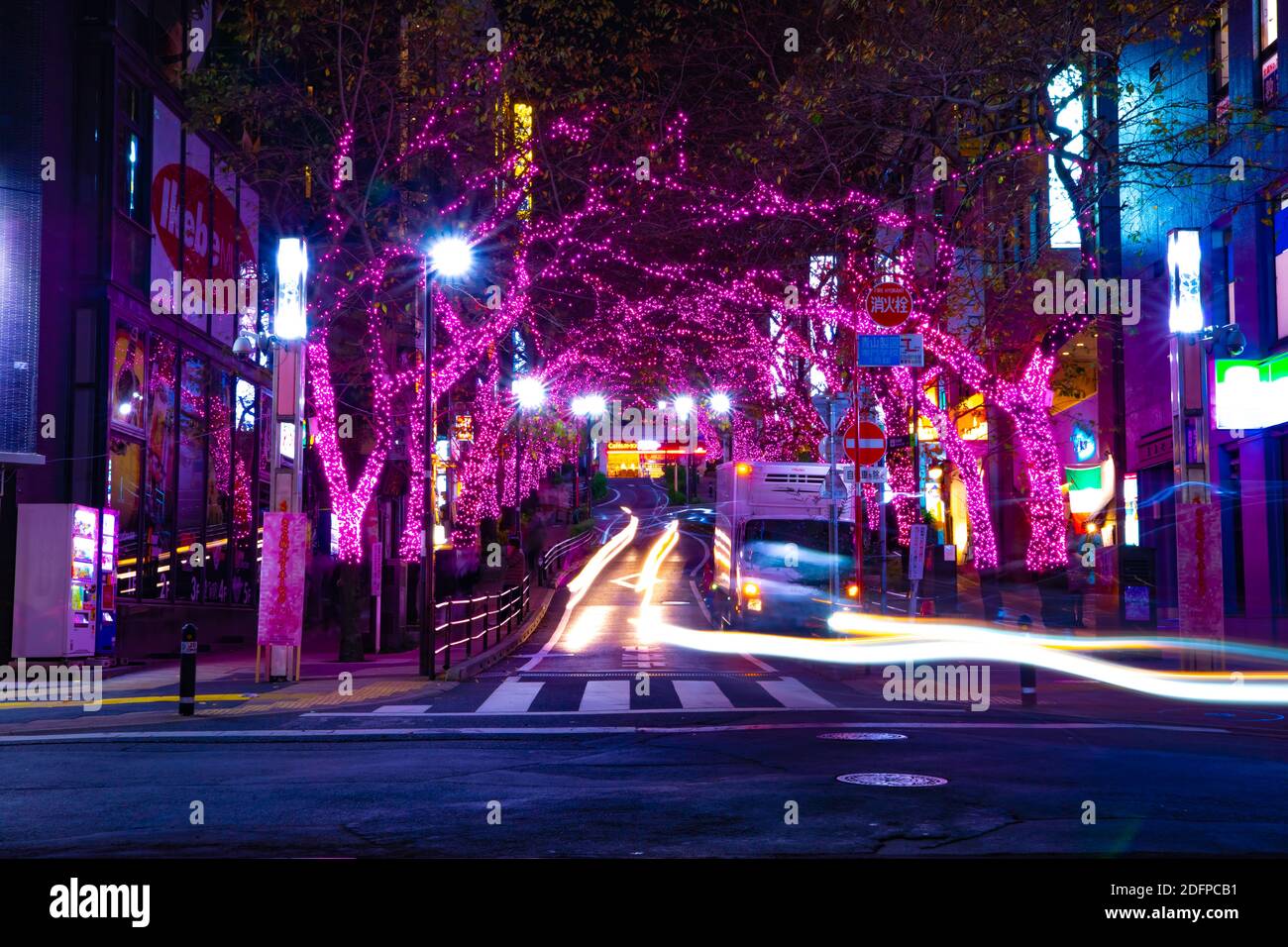 A night illuminated street in Shibuya middle shot Stock Photo - Alamy