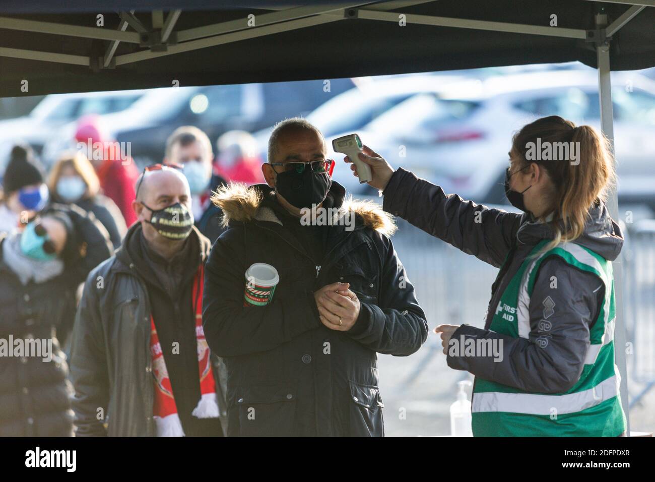 Football supporters having covid 19 temperature check on entry, UK Stock Photo