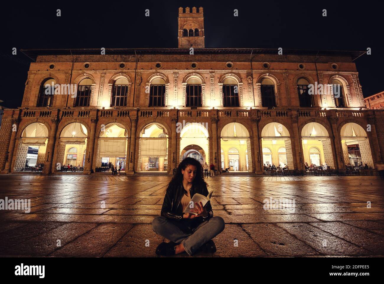 Girl in Main Square, Bologna Stock Photo