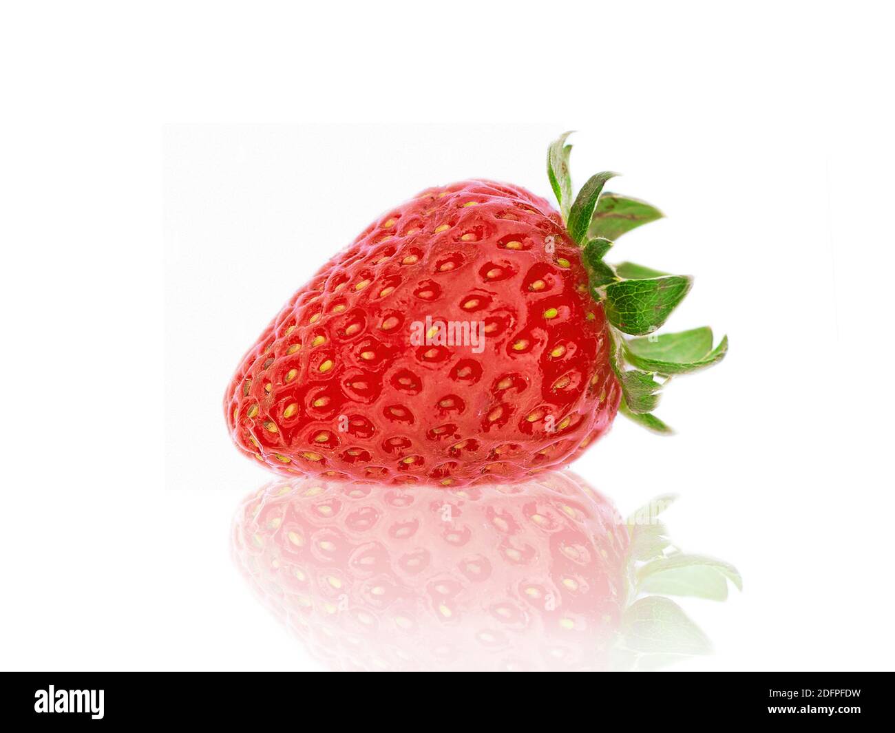 single fresh strawberry on white Stock Photo