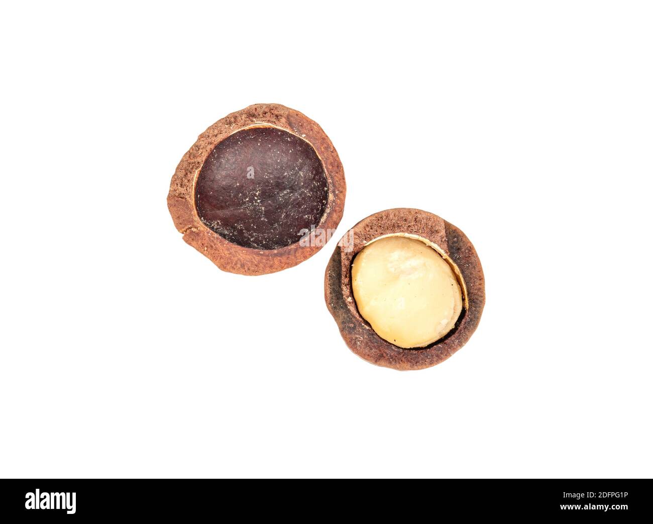 Split macadamia nut isolated on white background, top view Stock Photo