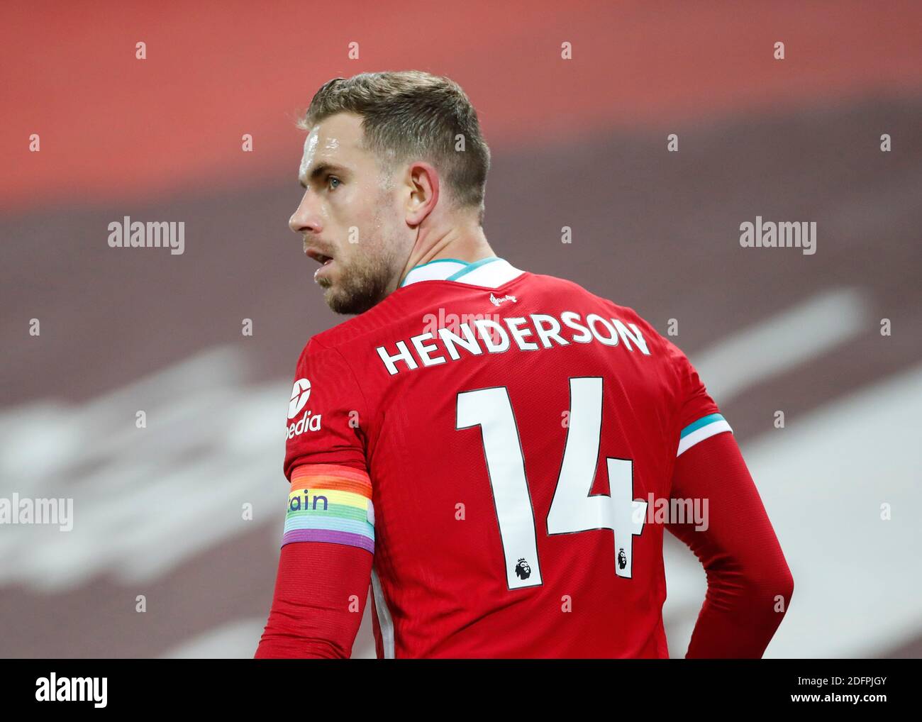 Liverpool's Jordan Henderson wears a rainbow coloured captain's armband in support of the Rainbow Laces campaign during the Premier League match at Anfield, Liverpool. Stock Photo