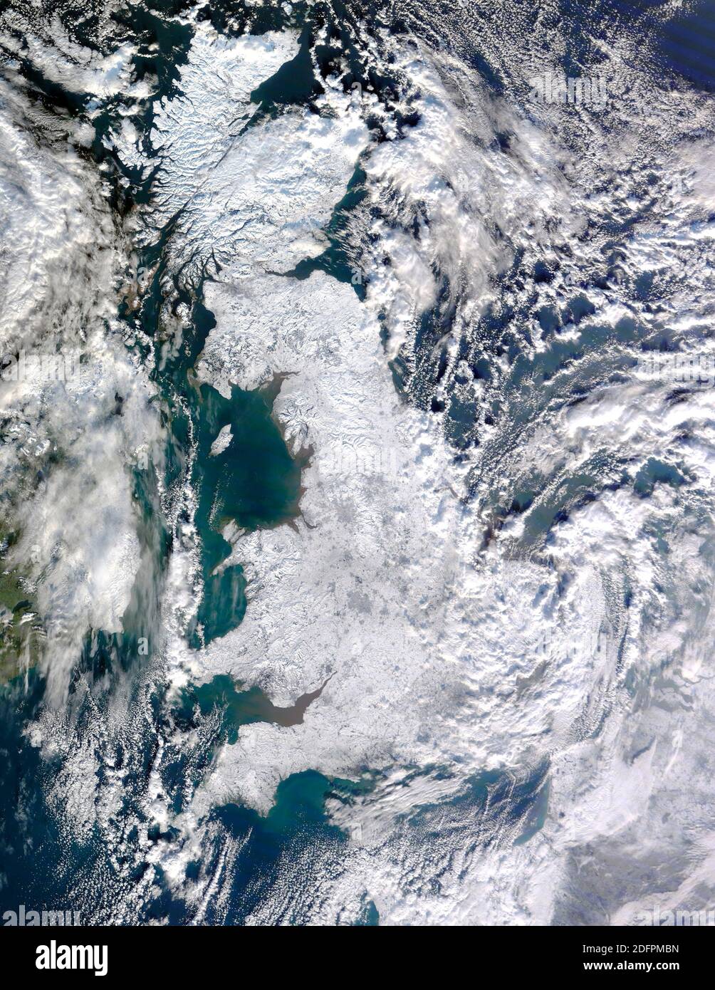 BRITISH ISLES -- 07 January 2010 - This NASA satellite image shows the United Kingdom of Great Britain and Northern Ireland almost entirely blanketed Stock Photo