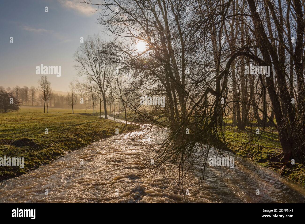 Swelling river on a bright December morning, Boughton Estate Stock Photo
