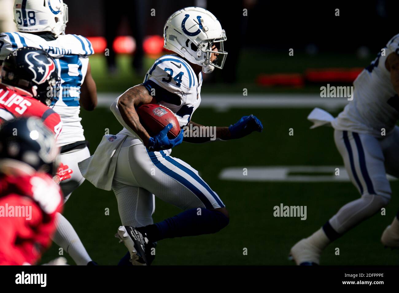 Houston, TX, USA. 6th Dec, 2020. Indianapolis Colts cornerback Isaiah Rodgers (34) carries the ball during the 1st quarter of an NFL football game between the Indianapolis Colts and the Houston Texans at NRG Stadium in Houston, TX. Trask Smith/CSM/Alamy Live News Stock Photo