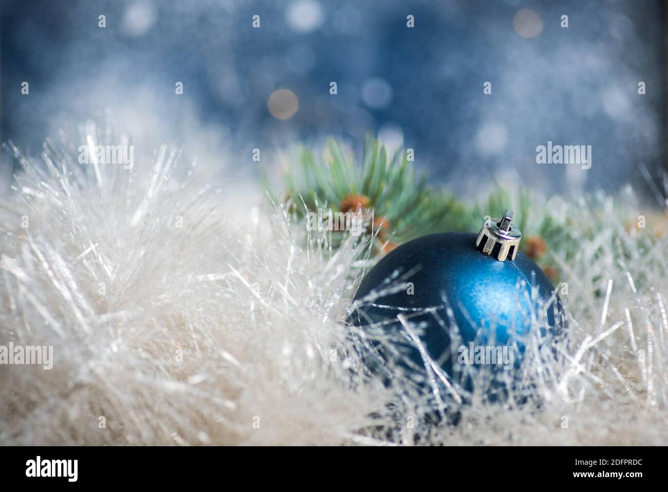 Christmas ball ornament with winter holiday festive background Stock Photo