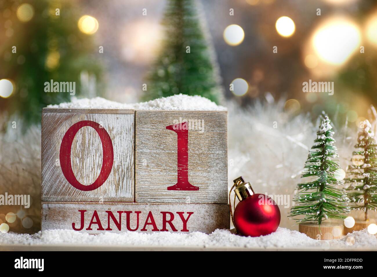 1st January sign for New Year and Christmas tree winter holiday festive background and ornaments Stock Photo