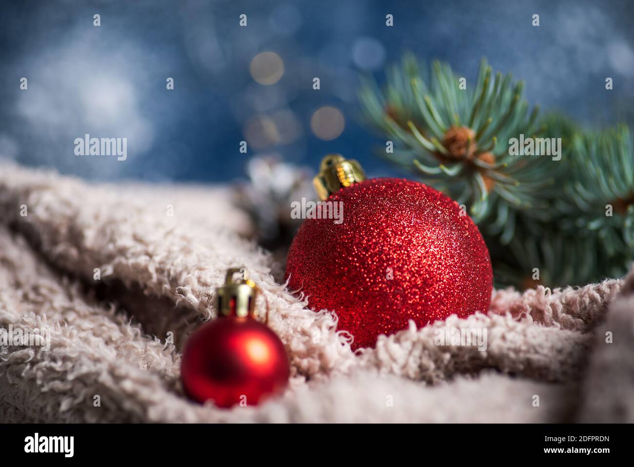 Red Christmas ball ornament with winter holiday festive background Stock Photo