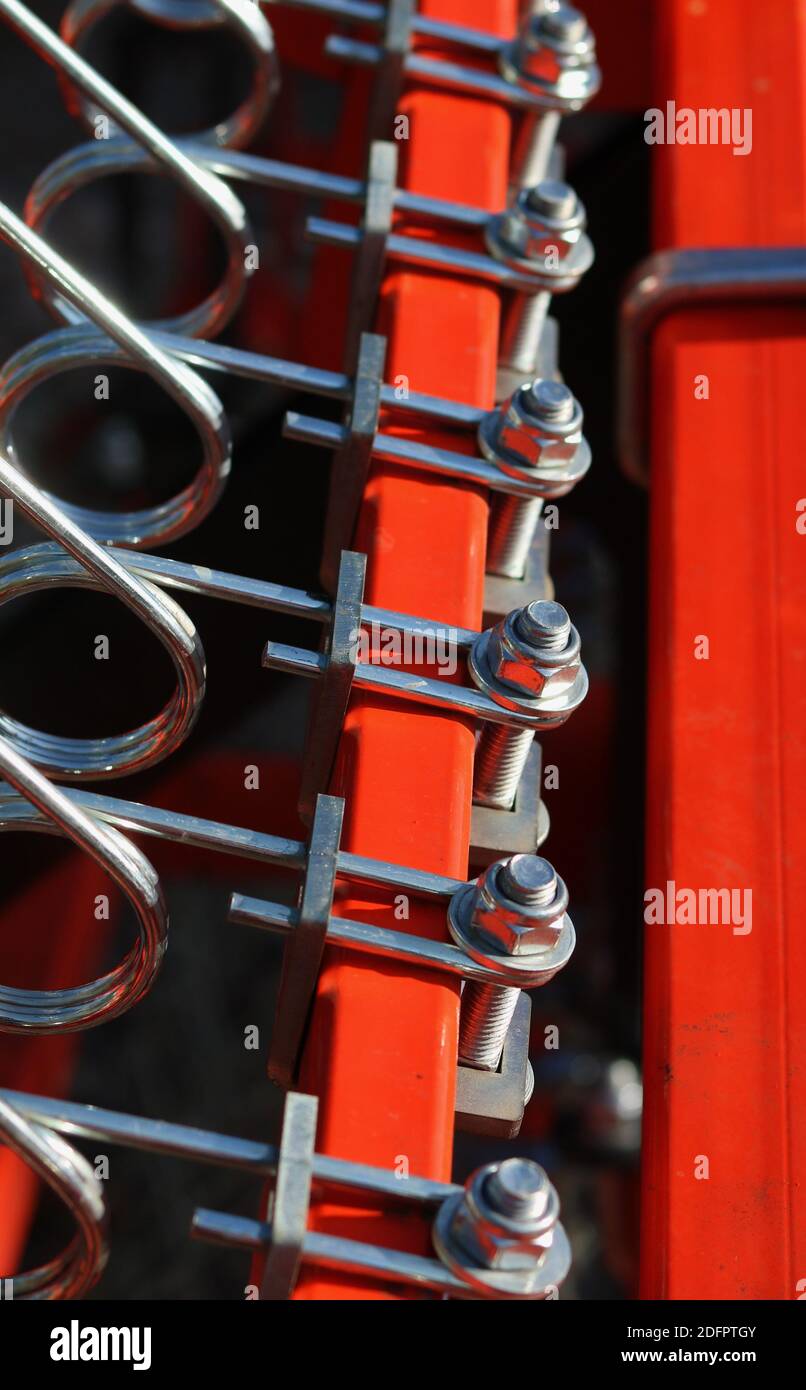 15 November 2020 - Middlesex, UK: Close up of springs on farm machinery  Stock Photo