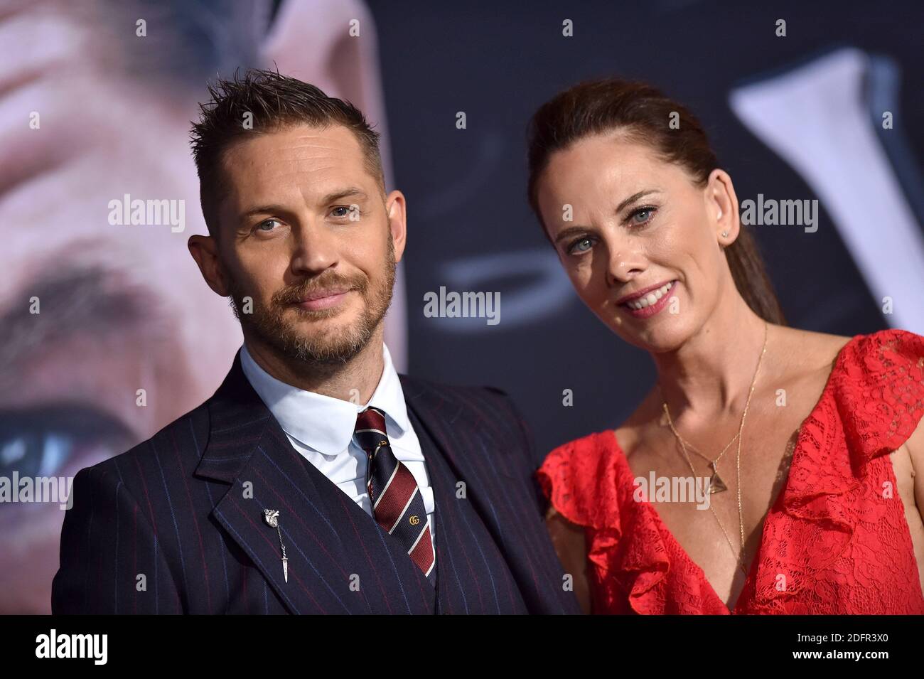 Tom Hardy And Kelly Marcel Attend The Premiere Of Columbia Pictures Venom At Regency Village 