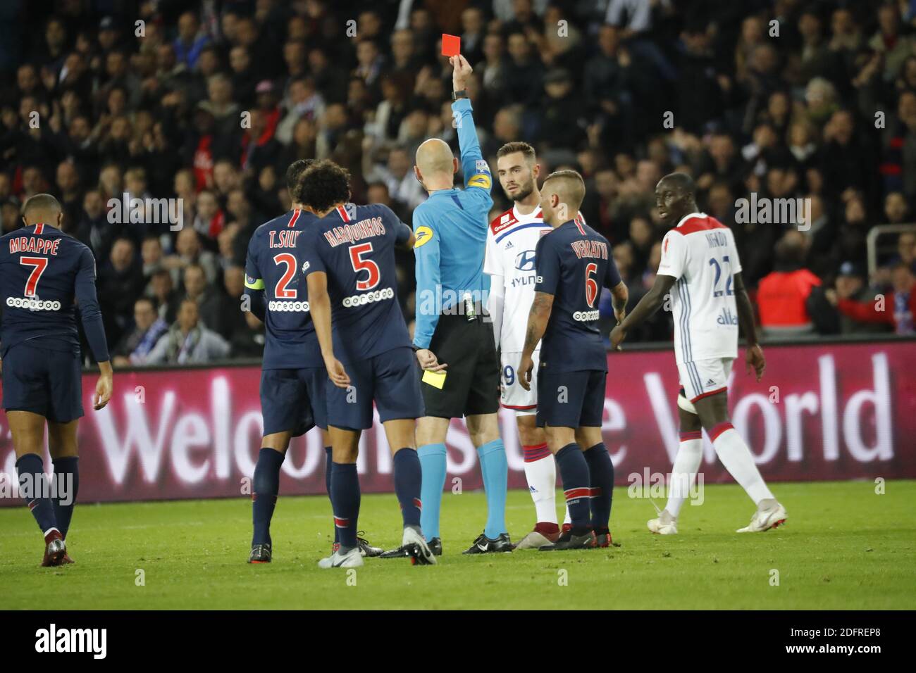 Lyon's Lucas Tousart receiving a red card from referee Abthony Gautier during the Ligue 1 Paris St-Germain (PSG) v Olympique Lyonnais football match at the Parc des Princes stadium in Paris, France on October 7, 2018. Paris Saint-Germain moved eight points clear at the top of Ligue 1 as Kylian Mbappe scored four goals in a 5-0 victory over Lyon. Photo by Henri Szwarc/ABACAPRESS.COM Stock Photo