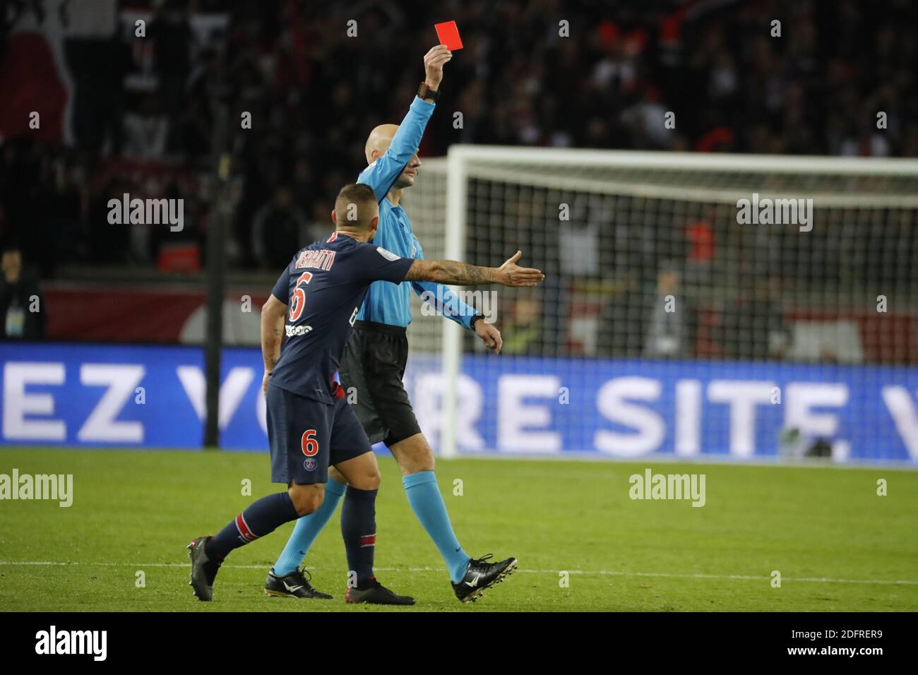 PSG's Fresnel Kimpembe receiving a red card from referee Abthony Gautier during the Ligue 1 Paris St-Germain (PSG) v Olympique Lyonnais football match at the Parc des Princes stadium in Paris, France on October 7, 2018. Paris Saint-Germain moved eight points clear at the top of Ligue 1 as Kylian Mbappe scored four goals in a 5-0 victory over Lyon. Photo by Henri Szwarc/ABACAPRESS.COM Stock Photo