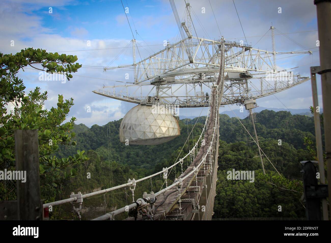 The Arecibo Observatory in Puerto Rico is one of the most important national centers for radio astronomy, planetary radar and ionospheric science. Photo by The University of Central Florida. Stock Photo