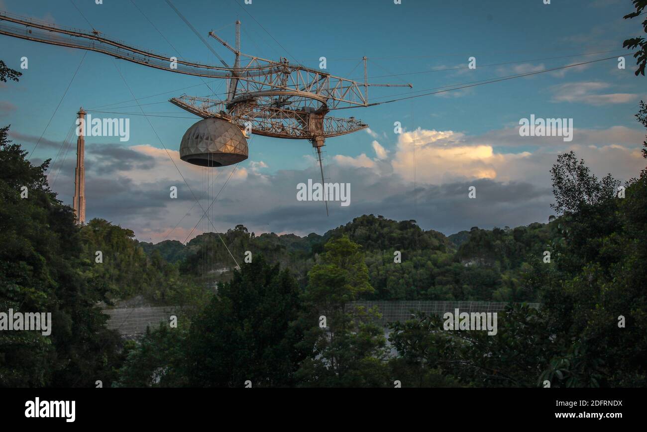 The Arecibo Observatory in Puerto Rico is one of the most important national centers for radio astronomy, planetary radar and ionospheric science. Photo by The University of Central Florida. Stock Photo