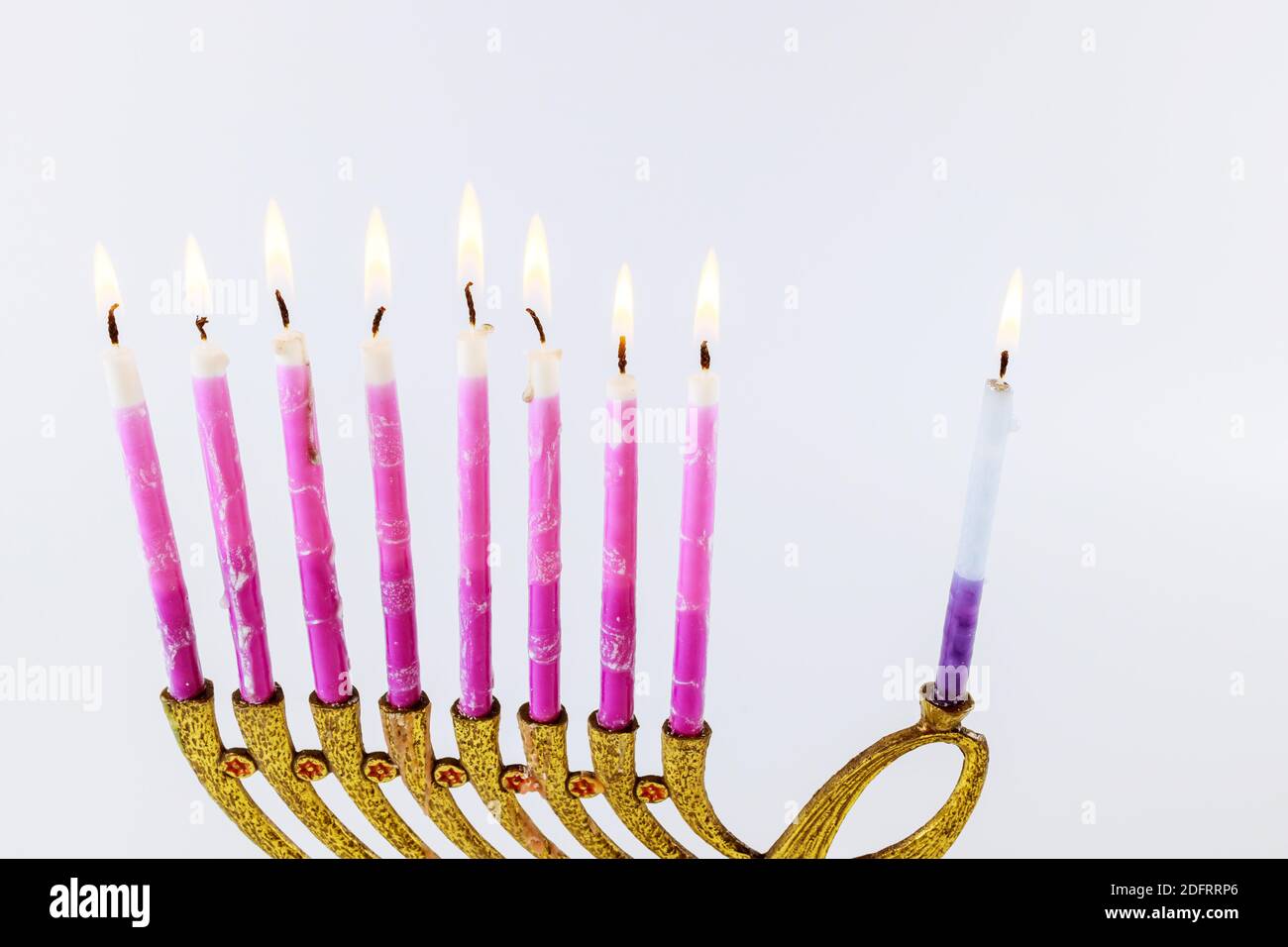Religion Jewish Hanukkah symbol holiday for in hanukkiah Menorah with burned candles Stock Photo