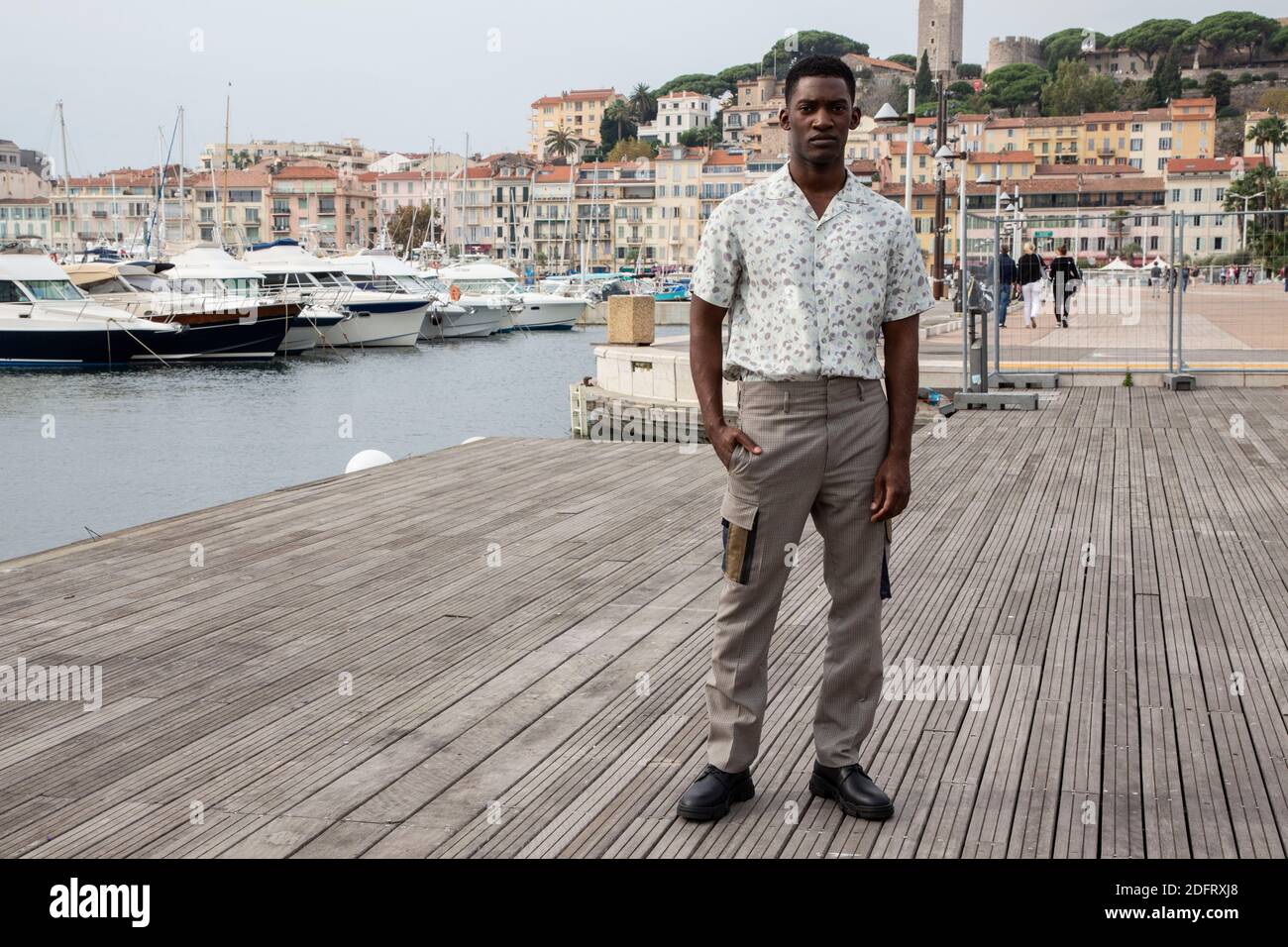 Malachi Kirby poses at the photocall of 'Curfew' during the MIPCOM in