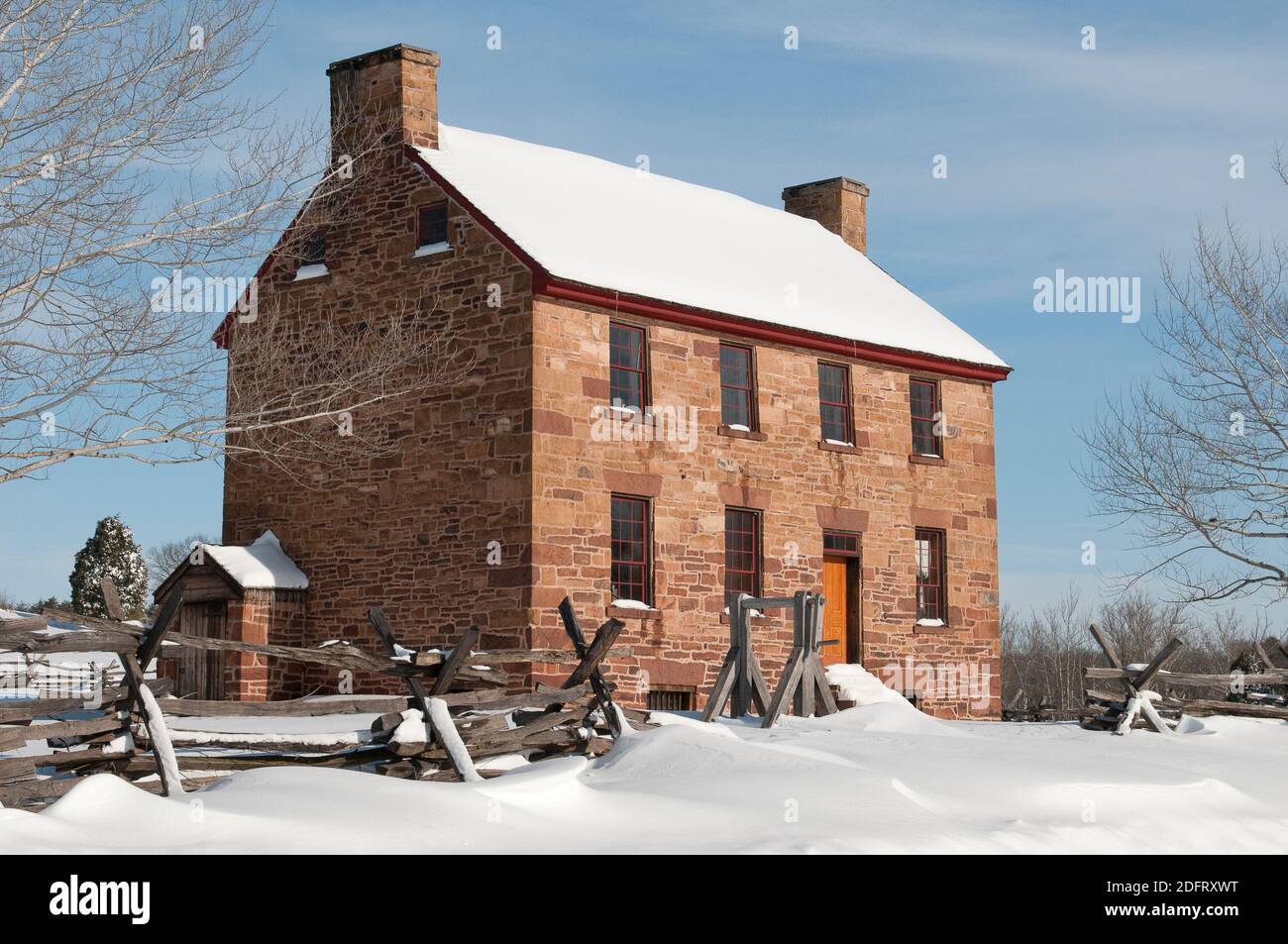 The Stone House at Manassas National Battlefield is blanketed in snow during winter. Stock Photo