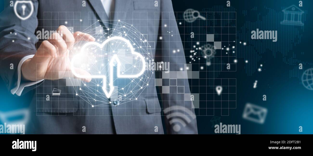 Man holding icon cloud computing data on global networking. Cloud technology of business and security concept. Mixed media Stock Photo