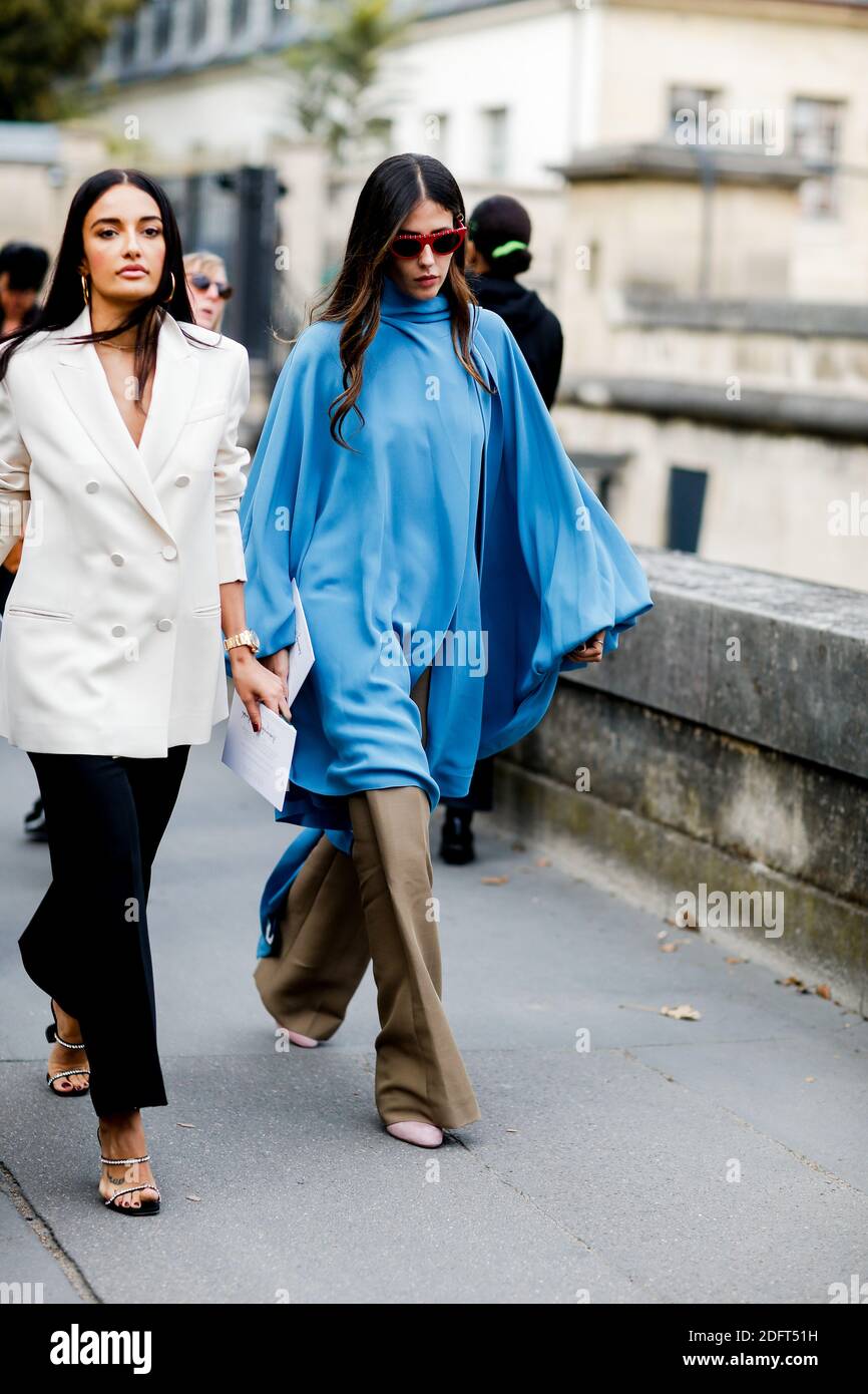 Street style, Amina Muaddi and Gilda Ambrosio arriving at Valentino ...