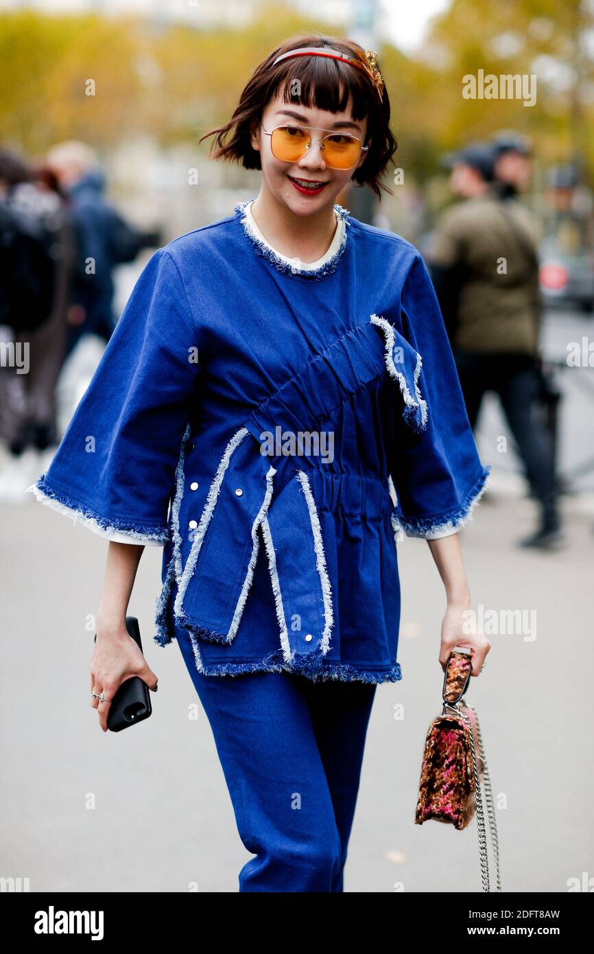 Street style, arriving at Miu Miu spring summer 2019 ready-to-wear show,  held at Palais d'Iena, in Paris, France, on October 2nd, 2018. Photo by  Marie-Paola Bertrand-Hillion/ABACAPRESS.COM Stock Photo - Alamy