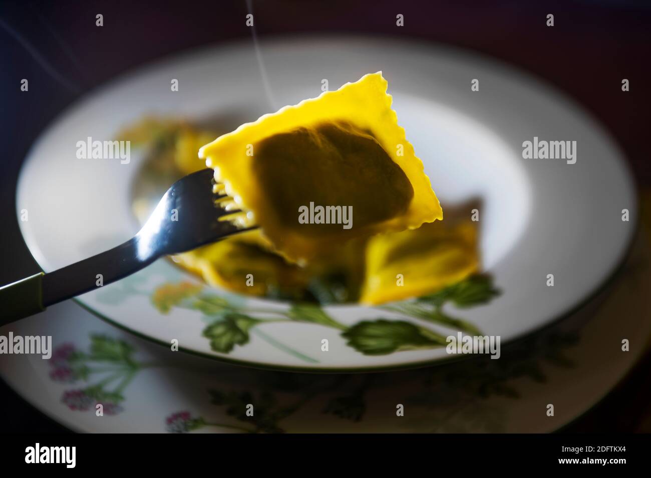 Homemade Ravioli in low light Stock Photo