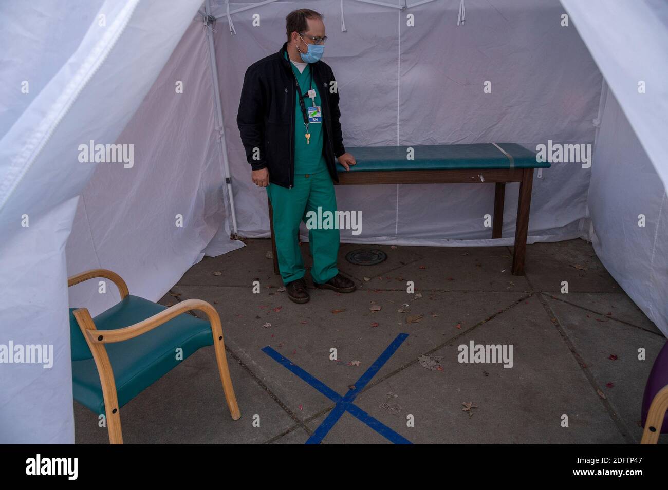 Placerville, California, USA. 2nd Dec, 2020. Jonathan Russell, RN, and chief ambulatory officer, stands inside a physical exam tent outside of Marshall Medical Center's clinic that is used to exam COVID suspect and positive patients in Placerville, CA on Wednesday, Dec. 2, 2020. 'This is one of the COVID modifications we had to make recently,'' said Russell. Credit: Renée C. Byer/ZUMA Wire/Alamy Live News Stock Photo