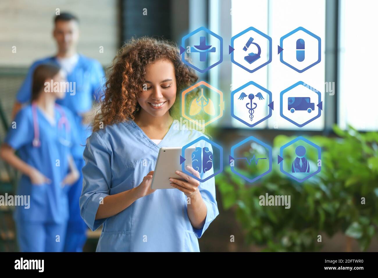 African american doctor using hi-res stock photography and images - Alamy