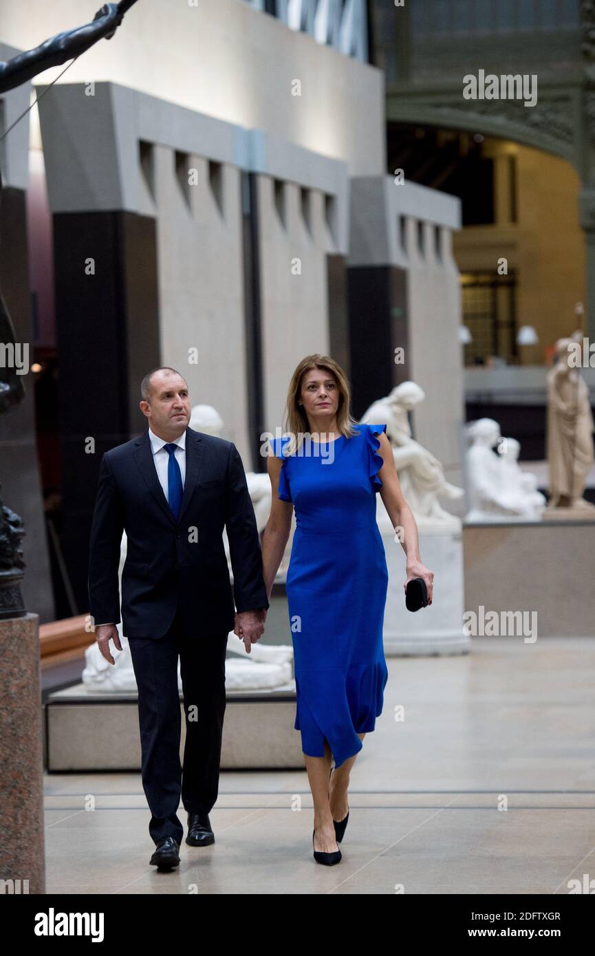 Bulgarian President Rumen Radev (L) and his wife Desislava Radeva (R)  arrive at the official dinner on the eve of the international ceremony for  the Centenary of the WWI Armistice of 11