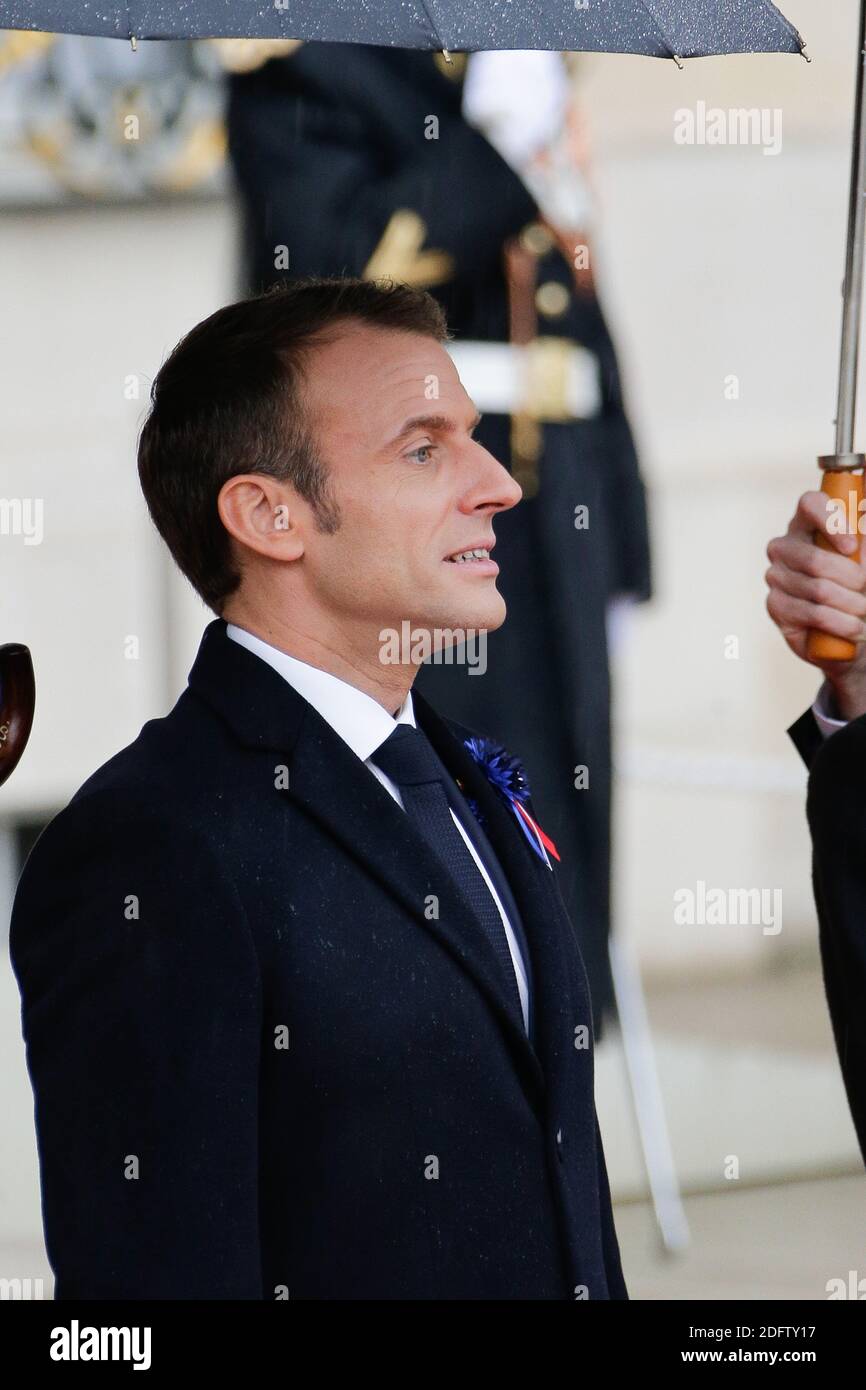 French President Emmanuel Macron and his wife Brigitte Macron welcome ...